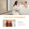 A mother and child in a bathroom, with a radiator in the background. Voir les images du produit