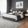 A couple relaxing on a bed in a bedroom. Produktbild-Vorschau