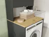 A laundry room scene showing a washing machine cabinet with a washing machine underneath and a basket of laundry on top. Anteprima dell’immagine prodotto