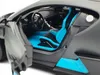 Close-up view of the interior of a Bugatti Divo R/C toy car, showing the seats, steering wheel, and dashboard. Produktbild-Vorschau