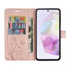 A pink wallet-style phone case with a Samsung Galaxy A35 phone inside, showing credit cards and cash. The case has a floral design. Produktbild-Vorschau