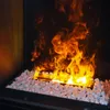 A close-up view of a fireplace with white stones and flames. Produktbild-Vorschau