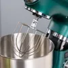 Close-up of a stand mixer attachment and bowl. Produktbild-Vorschau