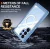 A light blue phone case with a magnetic ring is shown on a dark, rocky surface, with rocks scattered around. Náhled obrázku produktu