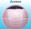 A pink star projector lamp with buttons on the front, set against a light blue background. Náhled obrázku produktu