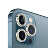 Close-up of the camera lenses of a blue smartphone, decorated with gold and diamond-like rings. Anteprima dell’immagine prodotto