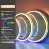 A close-up marketing image showing three round LED mirrors with RGB lighting, with text overlays describing features. Anteprima dell’immagine prodotto