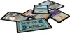 A collection of cards from a board game are spread out on a white surface. Náhľad obrázku produktu