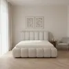 A bedroom scene featuring a bed. Náhľad obrázku produktu