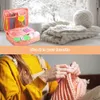 A collage showing a crochet kit and a person knitting. Produktbild-Vorschau