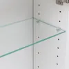 Close-up view of glass shelves inside a white cabinet. Produktbild-Vorschau
