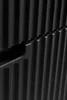 A close-up, abstract shot of a black ribbed surface, possibly a cabinet or furniture. Produktbild-Vorschau