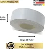A roll of light gray decorative edging tape with product information labels. Produktbild-Vorschau