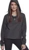 A woman wearing a black windbreaker. Produktbild-Vorschau