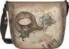 A close-up of a handbag with a whimsical illustration.