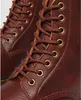 Close-up of the lacing and eyelets of brown leather boots. Produktbild-Vorschau