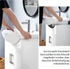 A person installing a ceramic sink into a white cabinet in a bathroom. Produktbild-Vorschau
