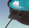 A close-up view of the top part of a teal and black device, showing a power cord plugged into a holder with a plug icon. Anteprima dell’immagine prodotto