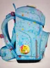 A blue backpack with a star pattern and a cartoon character on the front. Produktbild-Vorschau