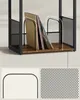 Close-up of a record player stand with records being stored. Náhled obrázku produktu