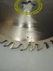 A close-up view of a circular saw blade with markings and teeth. Anteprima dell’immagine prodotto