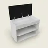 A white shoe cabinet with a black lid open, revealing a white interior and a faucet. It has two open shelves below. Produktbild-Vorschau