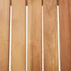 A close-up view of wooden planks with visible grain and texture. Produktbild-Vorschau