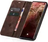 A brown leather flip case for a Samsung Galaxy S10 phone, shown open with the phone inside and cards and cash in the wallet section. Produktbild-Vorschau