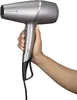 A hand holding a silver hair dryer against a white background. Anteprima dell’immagine prodotto