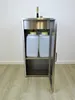 A stainless steel mobile sink with two large water containers inside, and a faucet on top. Podgląd zdjęcia produktu
