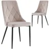 Two beige upholstered chairs with diamond stitching on the backrests and black metal legs are shown against a white background. One chair is in the foreground and slightly to the left, while the other is in the background and slightly to the right. Produktbild-Vorschau