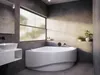 A modern bathroom with a corner bathtub and a sink. Produktbild-Vorschau