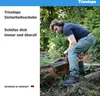 A man is using a chainsaw to cut a log in a forest setting. He is wearing work boots. Produktbild-Vorschau