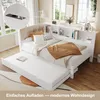 A white daybed with a pull-out trundle bed, set up in a room with large windows. The daybed has a tufted beige headboard and is dressed with bedding and pillows. A shelf unit is built into the headboard, displaying books and decorative items. A circular in Produktbild-Vorschau