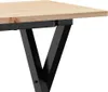 A close-up view of the corner of a wooden table with black metal legs. Produktbild-Vorschau