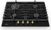 A top-down view of a black gas stovetop with four burners and gold control knobs. Náhľad obrázku produktu