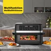 A modern kitchen counter with an air fryer and food. Produktbild-Vorschau