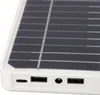 A close-up view of the ports and solar panel of a white portable charger. Produktbild-Vorschau