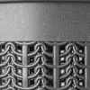 A close-up view of a textured surface and a chain-link pattern. Produktbild-Vorschau