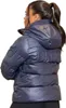 A woman wearing a navy puffer jacket. Voir les images du produit