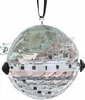 A crystal ornament shaped like a round object with a black accent on each side, hanging from a black ribbon. Produktbild-Vorschau