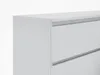 A close-up, studio shot of a white dresser with two visible drawers. Náhled obrázku produktu