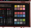 A close-up view of an open art supply case, showing various art supplies like oil pastels and watercolor pans. Náhľad obrázku produktu
