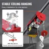 A close-up view of a red electric hoist, showing its mounting brackets and a stop device. Voir les images du produit