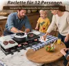 A family is gathered around a raclette grill on a table, enjoying a meal together. Náhľad obrázku produktu