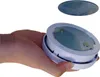 A hand holding a smoke detector with a magnetic mount. Another smoke detector is shown floating above. Produktbild-Vorschau