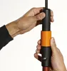 Hands adjusting a connection on a pole. Náhled obrázku produktu