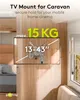 A TV mount is shown mounted on a wooden wall in a caravan, with a TV screen superimposed on it. Voir les images du produit