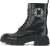 A black patent leather boot with laces and a decorative buckle with rhinestones. Produktbild-Vorschau
