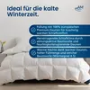 A white duvet is shown on a bed, with text overlays describing its features. Voir les images du produit